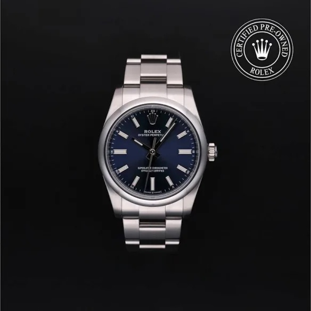 Rolex Oyster Perpetual with Silver Band and Deep Blue Dial